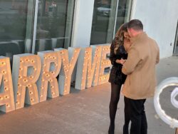 A man is proposing to his girl